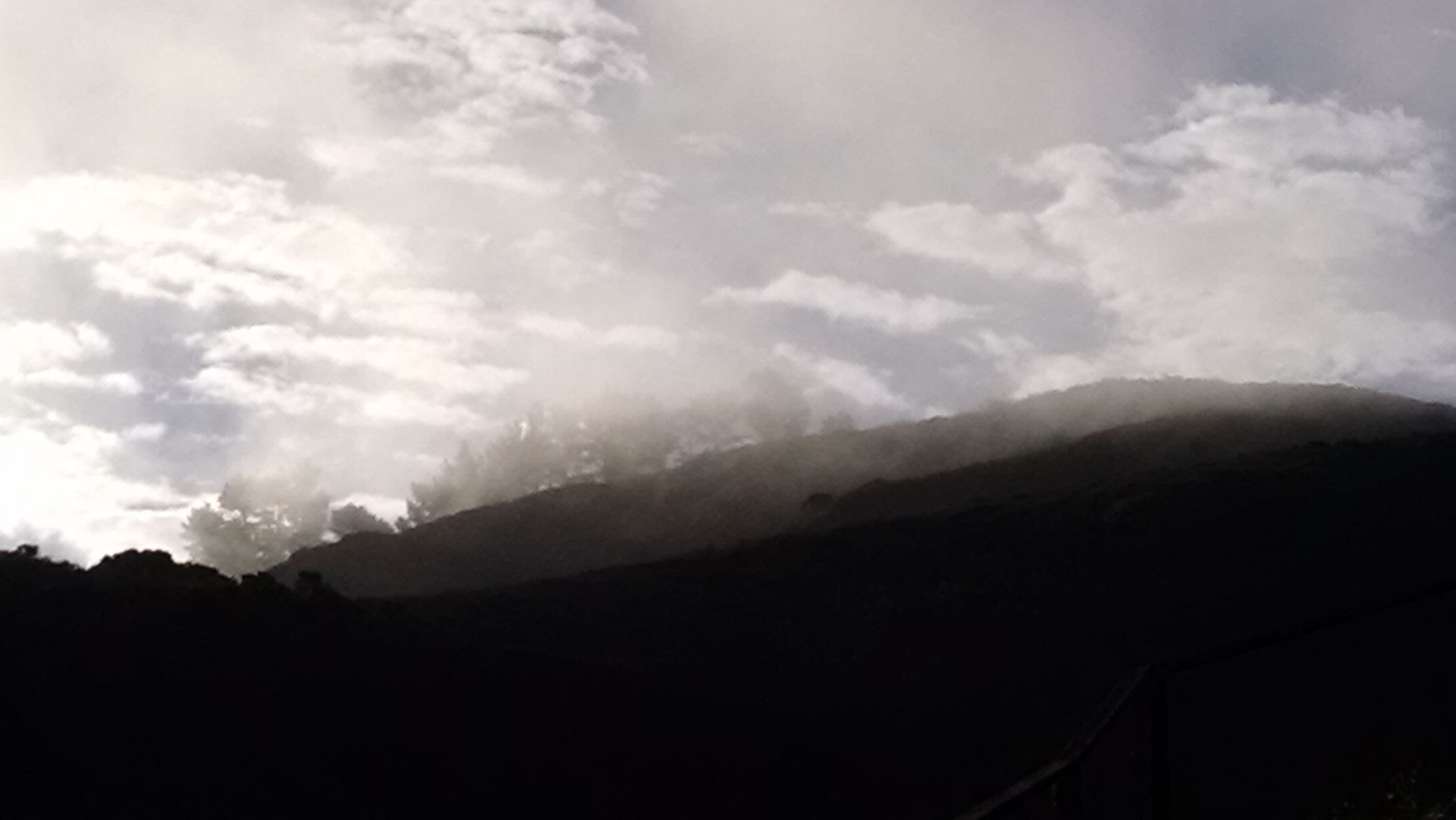 fog coming over the mountains Fog coming over the mountains. Copyright 2015 Shari L Brooks