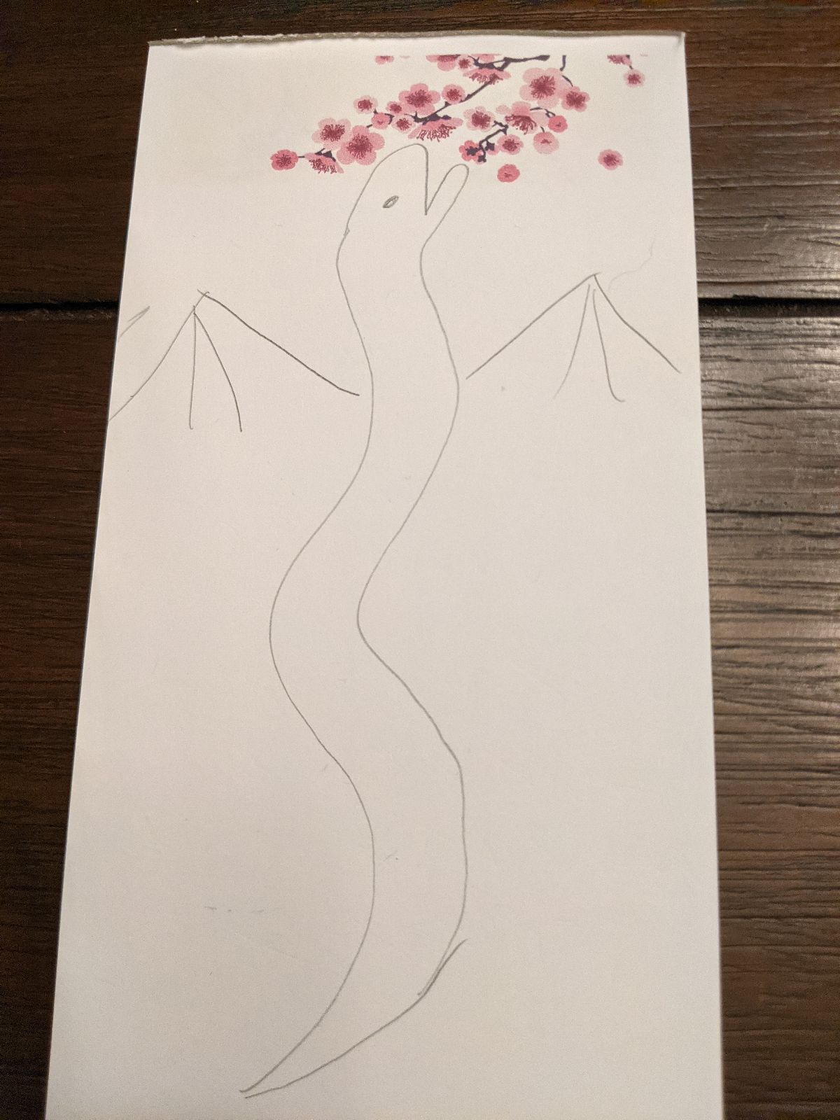 A crude drawing of a snake with wings facing straight ahead.

apparently this one has taken a liking for plum blossoms.

Copyright 2021 Clara E Lee.