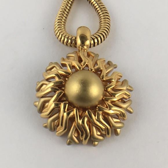 sunburst medallion image taken from https://poshmark.com/listing/Vintage-Monet-Sunburst-Medallion-Necklace-5b2fe81cbb7615b2d0b1c67c