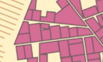 map with pink buildings of chaotic city streets.